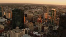HD stock footage aerial video of passing skyscrapers at sunset in Downtown Fort Worth, Texas Aerial Stock Footage | HDA12_006