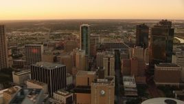 HD stock footage aerial video of passing tall high-rises buildings at sunset in Downtown Fort Worth, Texas Aerial Stock Footage | HDA12_009
