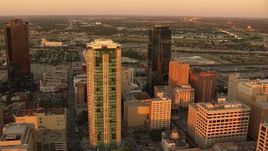 HD stock footage aerial video of flying by tall skyscrapers at sunset in Downtown Fort Worth, Texas Aerial Stock Footage | HDA12_011