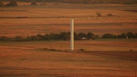 HD stock footage aerial video of a silo on a farm at sunrise in Oklahoma Aerial Stock Footage | HDA12_057