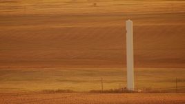 HD stock footage aerial video of a silo in the middle of a field at sunrise in Oklahoma Aerial Stock Footage | HDA12_059