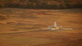 HD stock footage aerial video of a building in the middle of a field at sunrise in Oklahoma Aerial Stock Footage | HDA12_068