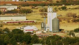HD stock footage aerial video of silos in the town of Walters, Oklahoma Aerial Stock Footage | HDA12_082