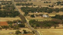 HD stock footage aerial video of a country road and farms in Temple, Oklahoma Aerial Stock Footage | HDA12_108
