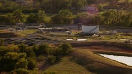 HD stock footage aerial video of a water treatment plant at sunset in Duncan, Oklahoma Aerial Stock Footage | HDA12_126
