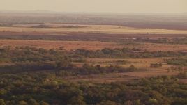 HD stock footage aerial video of farmland and rural countryside at sunset in Oklahoma Aerial Stock Footage | HDA12_139