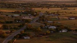 HD stock footage aerial video of a small rural town at sunset in Nocona, Texas Aerial Stock Footage | HDA12_149