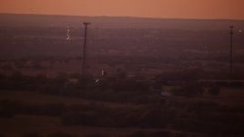 HD stock footage aerial video of a train passing through farmland at night in Decatur, Texas Aerial Stock Footage | HDA12_182