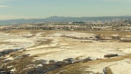 HD stock footage aerial video fly over fields toward suburban homes in Castle Pines, Colorado Aerial Stock Footage | HDA13_276