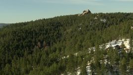 HD stock footage aerial video of flying over homes and forest in the Rocky Mountains, Colorado Aerial Stock Footage | HDA13_286