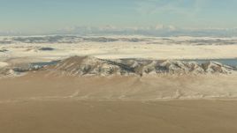 HD stock footage aerial video of Spinney Mountains with snow and lake in Park County, Colorado Aerial Stock Footage | HDA13_307
