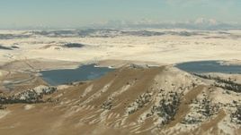 HD stock footage aerial video of mountains with light snow and a lake in Park County, Colorado Aerial Stock Footage | HDA13_309