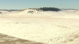 HD stock footage aerial video descend toward snowy hills in Park County, Colorado Aerial Stock Footage | HDA13_314