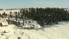 HD stock footage aerial video approach and fly over snowy hill in Park County, Colorado Aerial Stock Footage | HDA13_316