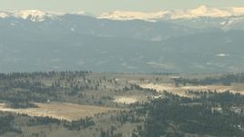 HD stock footage aerial video of hillside homes and the Rocky Mountains. Colorado Aerial Stock Footage | HDA13_341