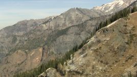 HD stock footage aerial video tilt up rugged slopes to reveal rugged Rocky Mountains, Colorado Aerial Stock Footage | HDA13_351_01