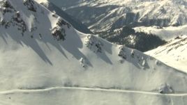 HD stock footage aerial video flyby snowy mountain ridge, Rocky Mountains, Colorado Aerial Stock Footage | HDA13_358