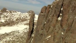 HD stock footage aerial video flyby rocky protrusion and over a ridge in the Rocky Mountains, Colorado Aerial Stock Footage | HDA13_376