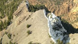 HD stock footage aerial video fly over a ridge to reveal a canyon in the Rocky Mountains, Colorado Aerial Stock Footage | HDA13_378