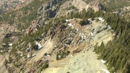 HD stock footage aerial video fly over a mountain ridge with patches of snow, Rocky Mountains, Colorado Aerial Stock Footage | HDA13_378_01
