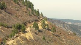 HD stock footage aerial video of a road on a mountain slopes in the Rocky Mountains, Colorado Aerial Stock Footage | HDA13_382