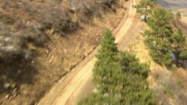 HD stock footage aerial video of following a road up a mountain slope in the Rocky Mountains, Colorado Aerial Stock Footage | HDA13_382_01