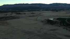 HD stock footage aerial video of flying over open fields at sunrise, Ridgway, Colorado Aerial Stock Footage | HDA13_397