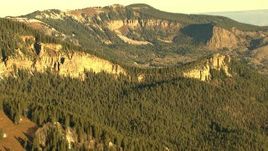HD stock footage aerial video of mountain ridges and evergreen trees at sunrise in Rocky Mountains, Colorado Aerial Stock Footage | HDA13_403_06