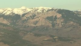 HD stock footage aerial video of tall mountains with snow at sunrise, Rocky Mountains, Colorado Aerial Stock Footage | HDA13_432