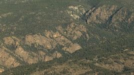 HD stock footage aerial video of a canyon through hills at sunrise, Rocky Mountains, Colorado Aerial Stock Footage | HDA13_439