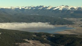 HD stock footage aerial video of fog on the Taylor Park Reservoir at sunrise near the Rocky Mountains, Colorado Aerial Stock Footage | HDA13_441