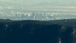 HD stock footage aerial video of the Denver skyline seen from the Rocky Mountains, Colorado Aerial Stock Footage | HDA13_477