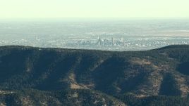 HD stock footage aerial video of Denver's skyline seen from the Rocky Mountains, Colorado, zoom to wider view Aerial Stock Footage | HDA13_480_01