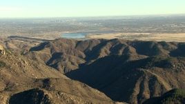 HD stock footage aerial video of reservoirs and the Rocky Mountains, zoom tighter on Downtown Denver, Colorado Aerial Stock Footage | HDA13_482_04