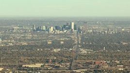 HD stock footage aerial video of Downtown Denver and suburbs, and zoom to a wider view, Colorado Aerial Stock Footage | HDA13_485_02