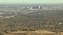 HD stock footage aerial video of zooming to a closer view of Downtown Denver and suburbs in Colorado Aerial Stock Footage | HDA13_485_04