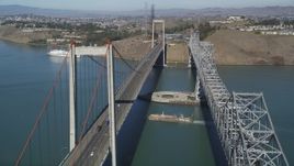 5K aerial stock footage flying by both spans of the Carquinez Bridge, Carquinez Strait, Vallejo, California Aerial Stock Footage | JDC01_032