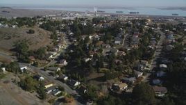 5K aerial stock footage fly over suburban tract homes, reveal Valero Oil Refinery, Benicia, California Aerial Stock Footage | JDC01_033