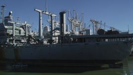 5K aerial stock footage tilt to reveal National Defense Reserve Fleet warships, Suisun Bay, California Aerial Stock Footage | JDC01_042