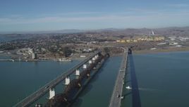 5K aerial stock footage of flying by Benicia-Martinez Bridge near Valero Oil Refinery; Benicia, California Aerial Stock Footage | JDC01_052