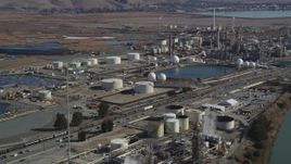 5K aerial stock footage of flying by oil refinery buildings at Tesoro Golden Eagle Refinery, Pacheco, California Aerial Stock Footage | JDC01_057