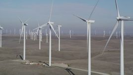 5K aerial stock footage of flying by rows of windmills, Shiloh Wind Power Plant, Montezuma Hills, California Aerial Stock Footage | JDC01_073