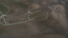 5K aerial stock footage orbit three windmills on hill, Shiloh Wind Power Plant, Montezuma Hills, California Aerial Stock Footage | JDC01_079