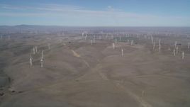 5K aerial stock footage of a hilly field with windmills, Shiloh Wind Power Plant, Montezuma Hills, California Aerial Stock Footage | JDC01_081