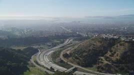 5K aerial stock footage fly over Oakland Hills revealing upscale hillside homes and freeway, Oakland, California  Aerial Stock Footage | JDC02_007