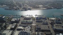 5K aerial stock footage follow Broadway to Jack London Square and Oakland Estuary, Downtown Oakland, California Aerial Stock Footage | JDC02_010