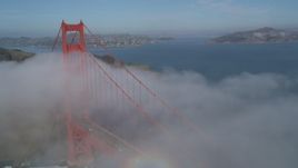 5K aerial stock footage of orbiting the famous Golden Gate Bridge, shrouded in fog, San Francisco, California Aerial Stock Footage | JDC02_013