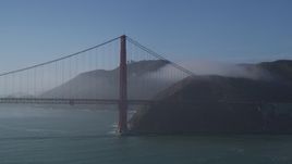 5K aerial stock footage of flying by the Golden Gate Bridge, light fog, San Francisco, California Aerial Stock Footage | JDC02_031