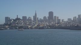 5K aerial stock footage of Fisherman's Wharf and city skyline seen from the bay, Downtown San Francisco, California Aerial Stock Footage | JDC02_037