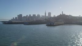 5K aerial stock footage of flying by Coit Tower and the city skyline, seen from the Bay, Downtown San Francisco, California Aerial Stock Footage | JDC02_039